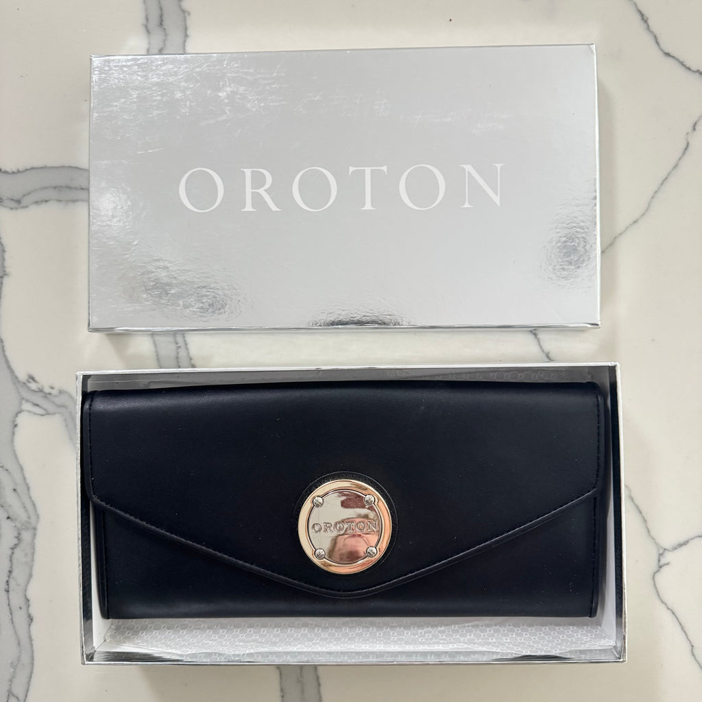 Oroton black leather clutch in box