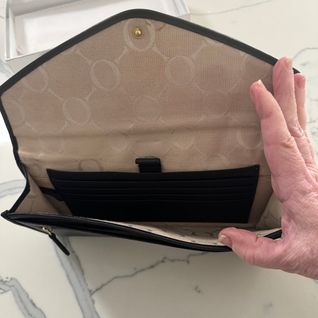 Oroton black leather clutch in box